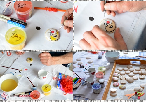 Macarons mit Clownsgesicht bemalen.